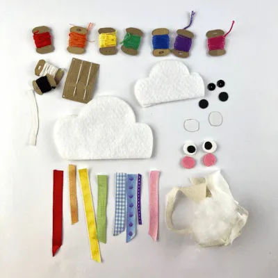 Cloud Face Softie Sewing Kit with pre-cut fabric, thread, stuffing, and hand sewing supplies for beginners