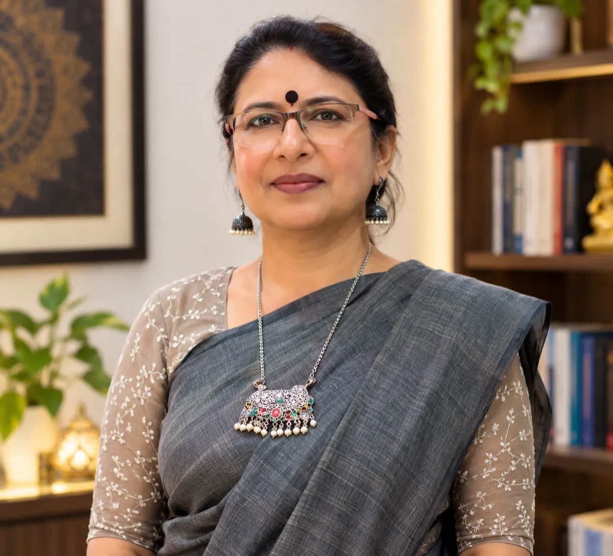 Pamposh Pokhriyal, founder of Hidden Stillness, resting in peaceful mindfulness