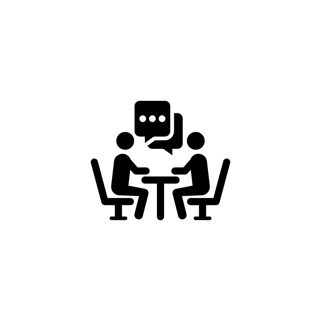 Two figures at table with speech bubbles, concept of consultation or meeting