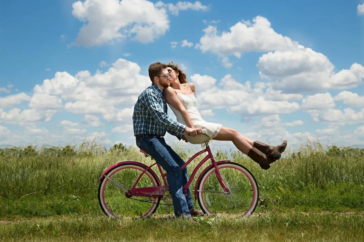 happy couple on bike