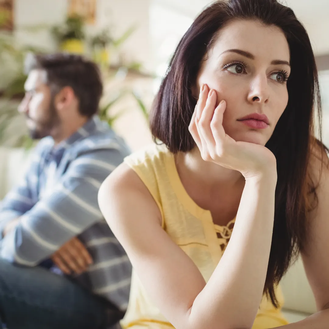 frustrated couple looking away from one another