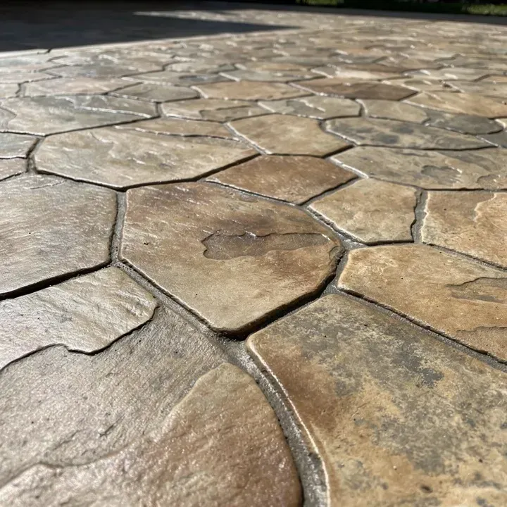 Close-up of a settled stamped concrete surface with stone pattern in Lake City, Florida