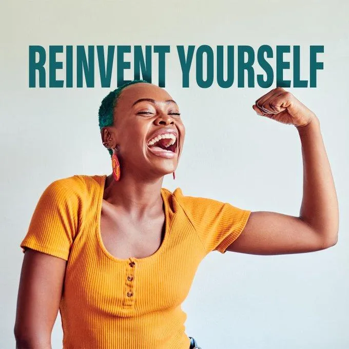 Bright workspace with laptop and 'Buy The Book' guide