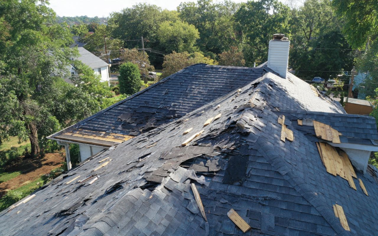 Tear off vs overlay roof replacement in New Rochelle options explained on a residential roof