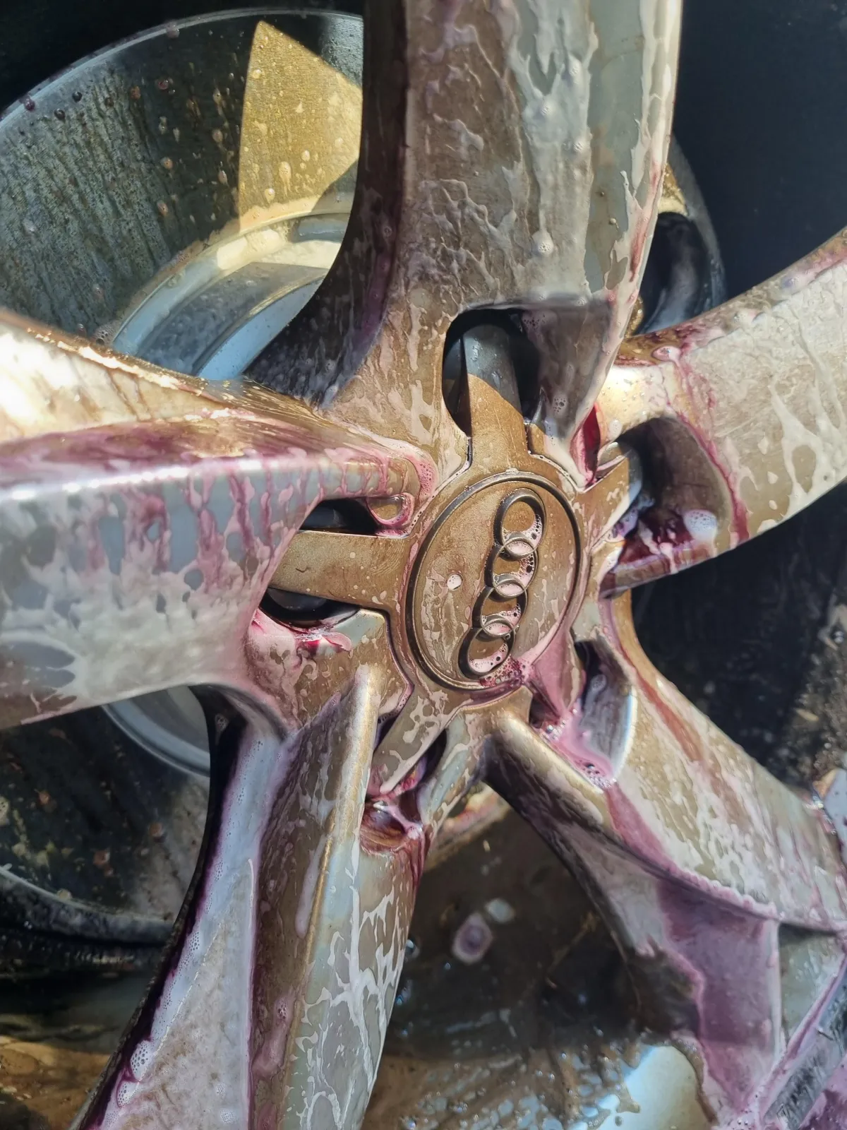 an image of ldi rims in the process of exterior rim clean by 