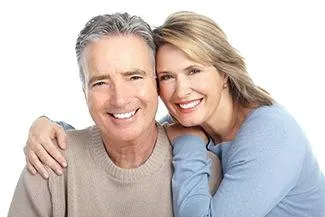 Satisfied beautiful older couple with Dental Implants 