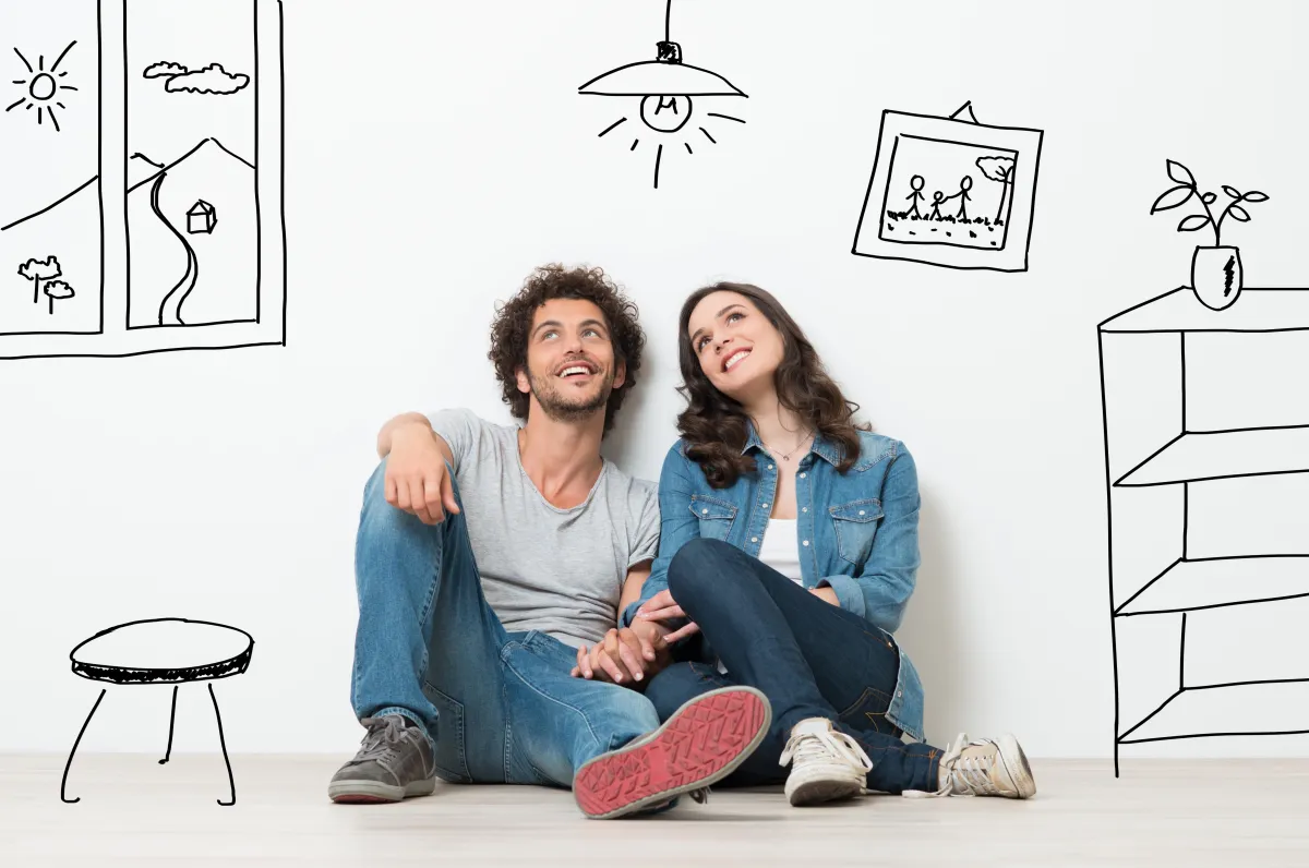Couple sitting in their new home