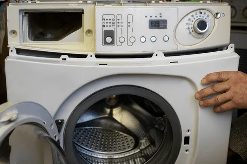 Washing machine repair technician