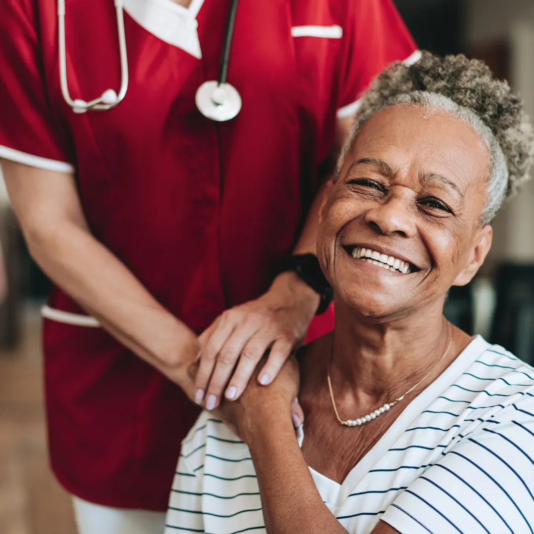 black, brown, and white bird standing on person right hand