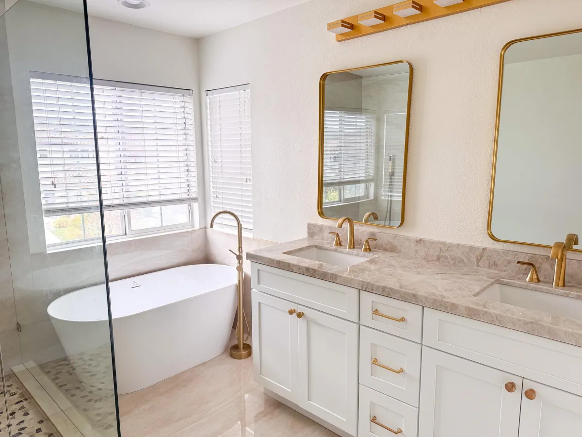 Luxury bathroom remodel with freestanding tub, walk-in glass shower, and floating vanity in Rancho Santa Fe
