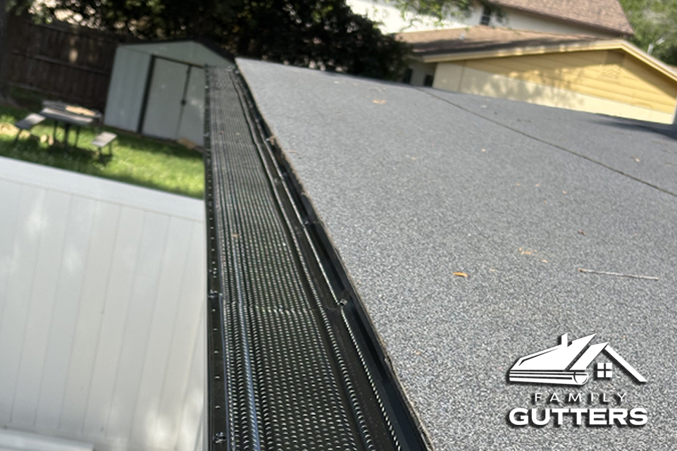 Mesh gutter guard keeping leaves out of gutter