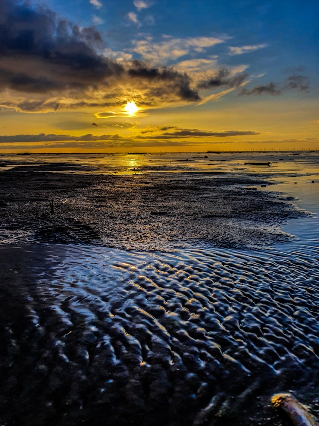 Sunset over an ocean beach