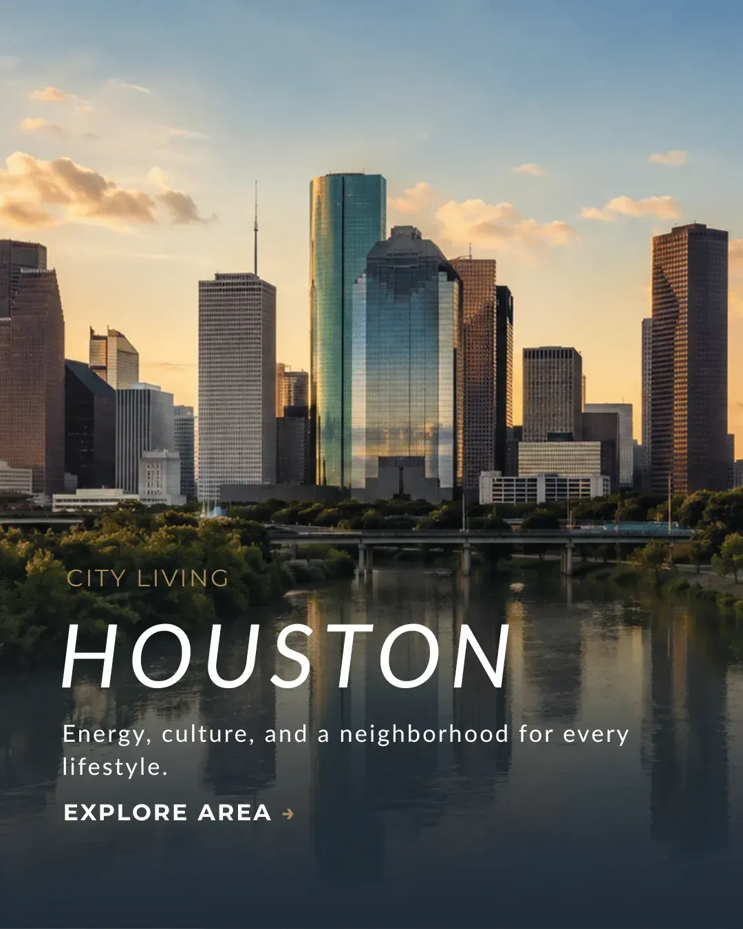 Downtown Houston skyline at sunset with high-rise buildings reflected over Buffalo Bayou