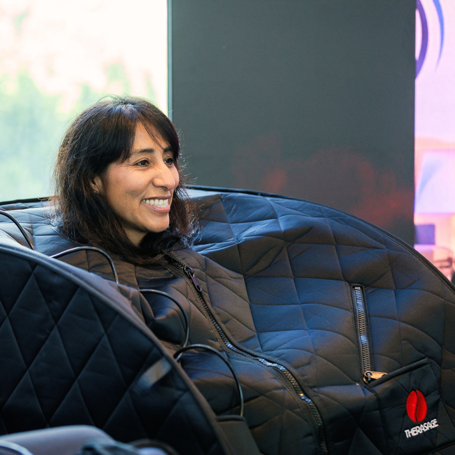 Woman Detoxing in Portable Sauna