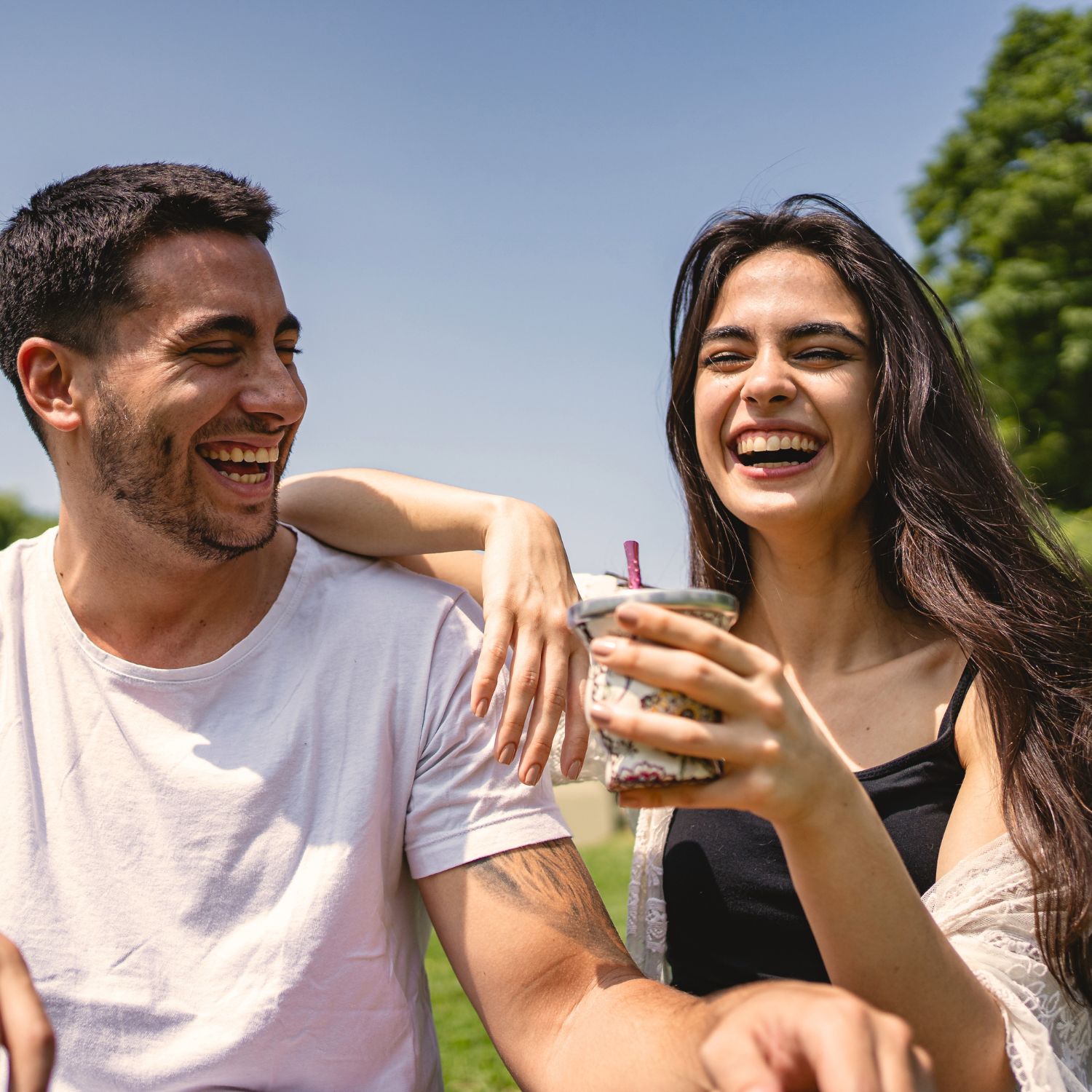 Man and Woman Laughing Outdoors