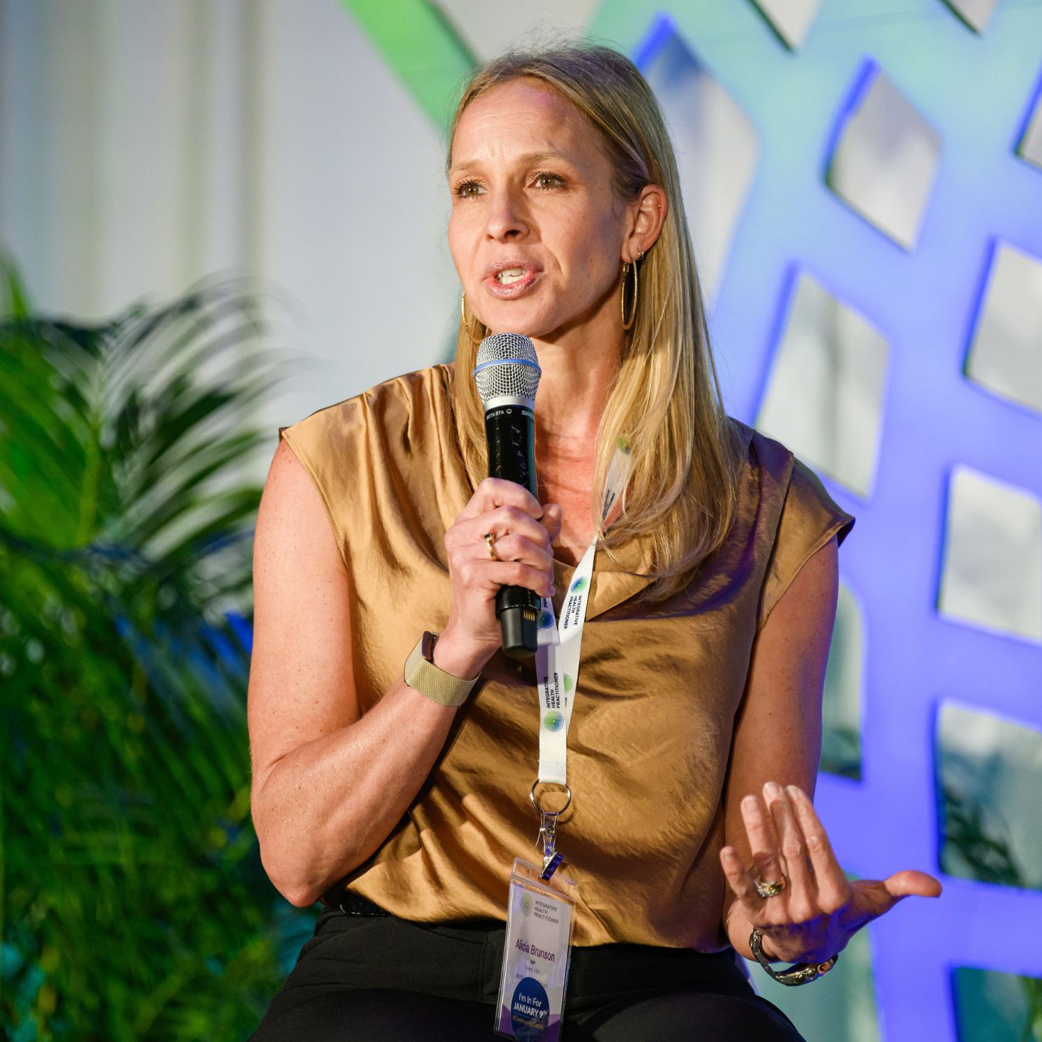 IHP Health Coach Speaking into Microphone