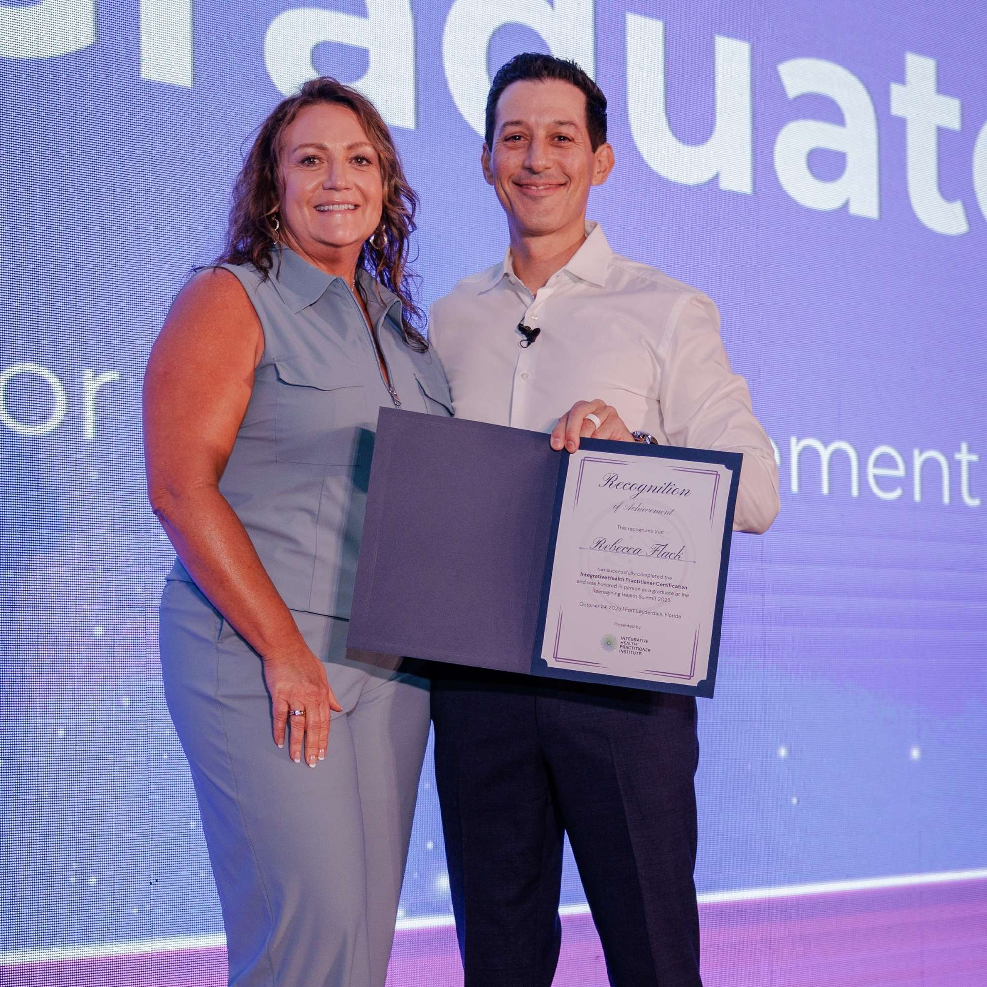 Rebecca Flack Graduating at RHS with Dr. Cabral