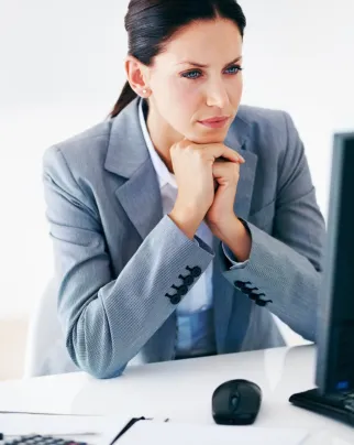 High-performing women looking lost while working at the offic e