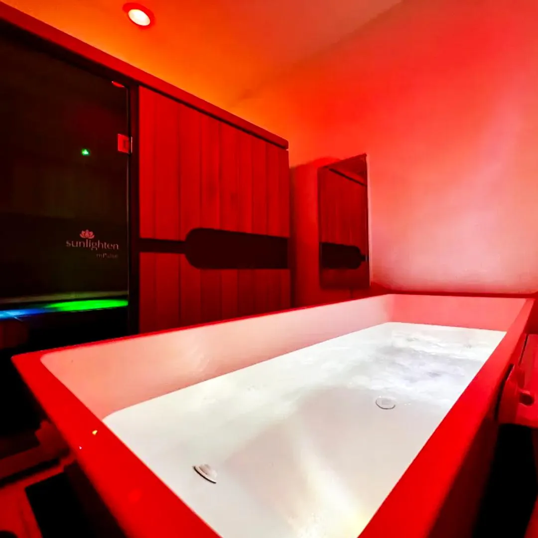 A cold plunge tub inside a private room.