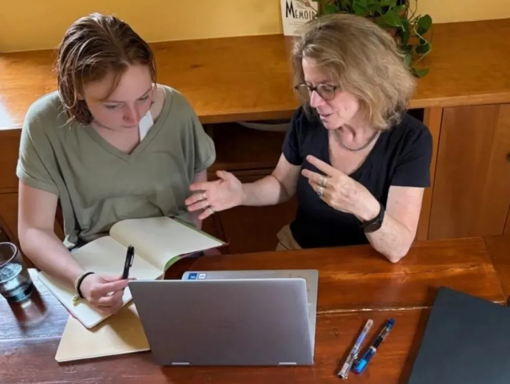 KindWrite Studio creative writing coach works with a client