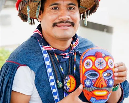 man holding a mask