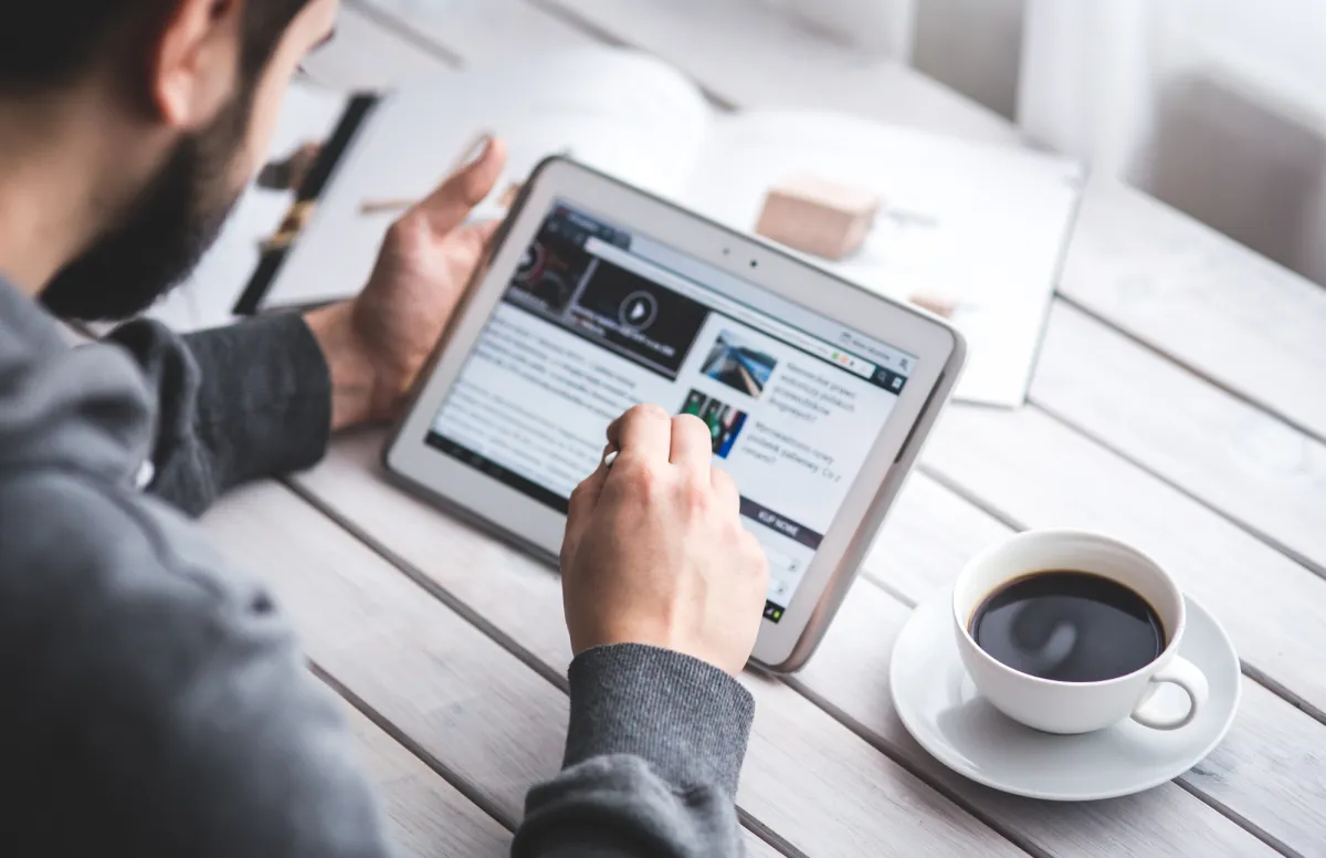 Man reading local Little Rock Township news