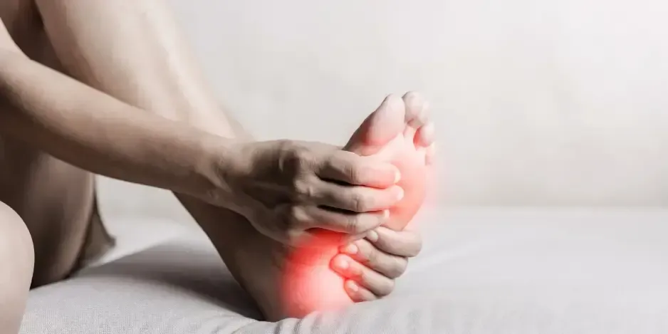Medical illustration showing peripheral neuropathy affecting nerves in the hands and feet