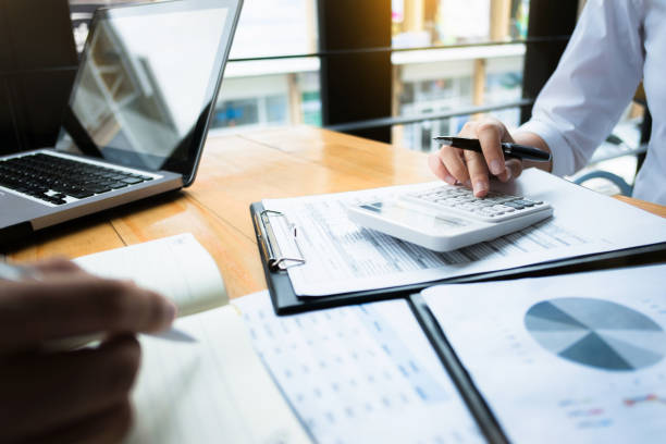 Business owner reviewing reports