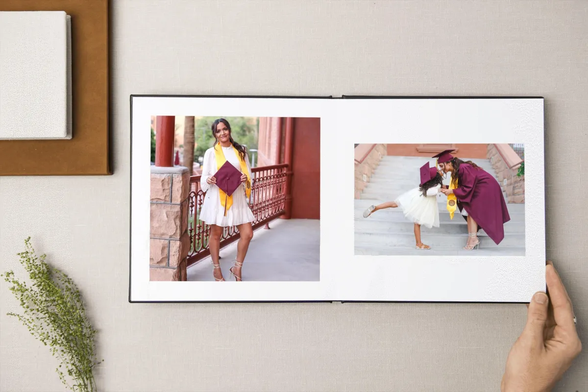 Custom graduation album of an ASU single mom and first-generation college graduate, sharing a proud moment with her daughter during their senior portrait session in Tempe, AZ.