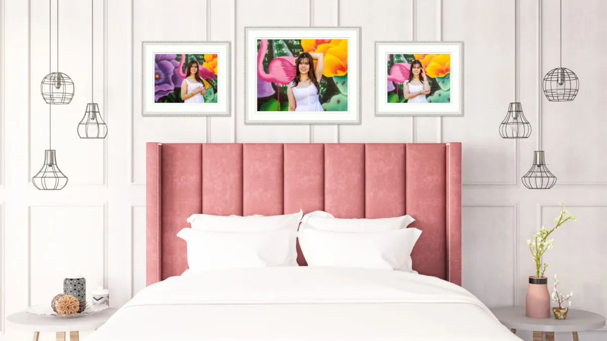 Framed senior portrait of a high school girl displayed in a stylish, modern bedroom — showcasing printed artwork from a custom session with Andria May Photography in Gilbert, AZ.