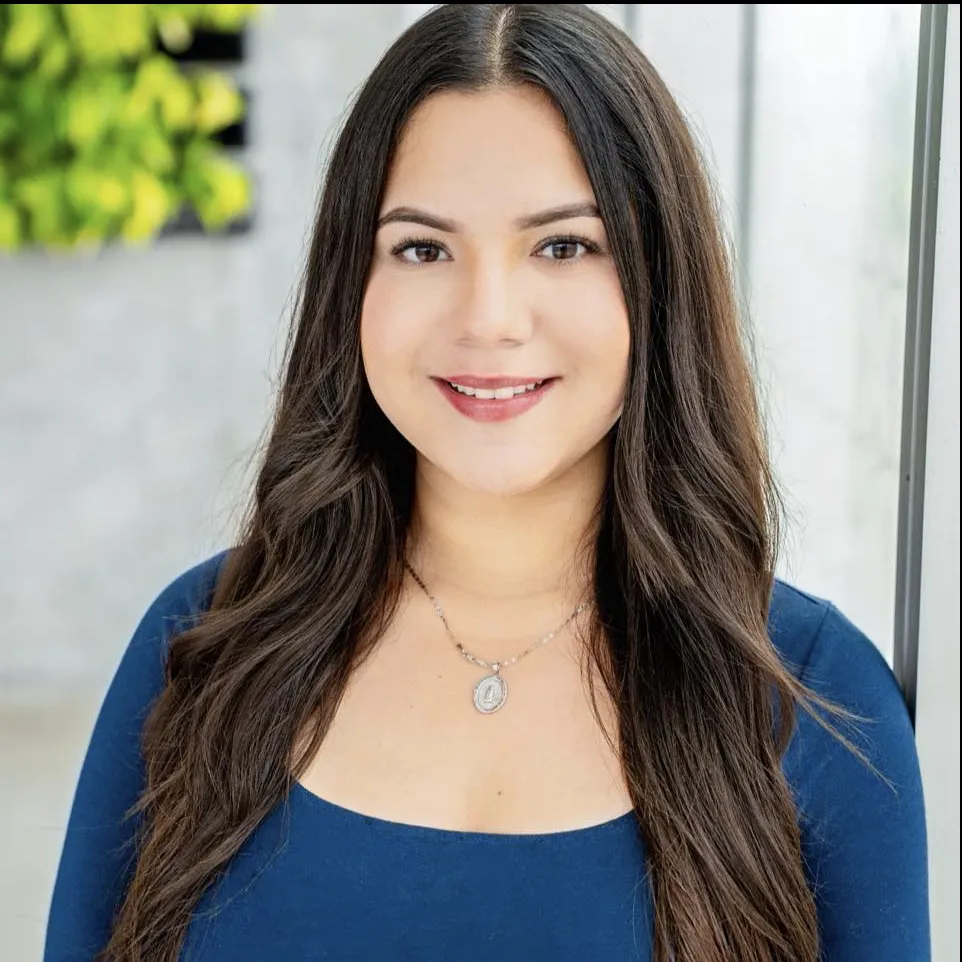 Portrait of Iowa City Realtor Mayela Pelayo hosting a workshop