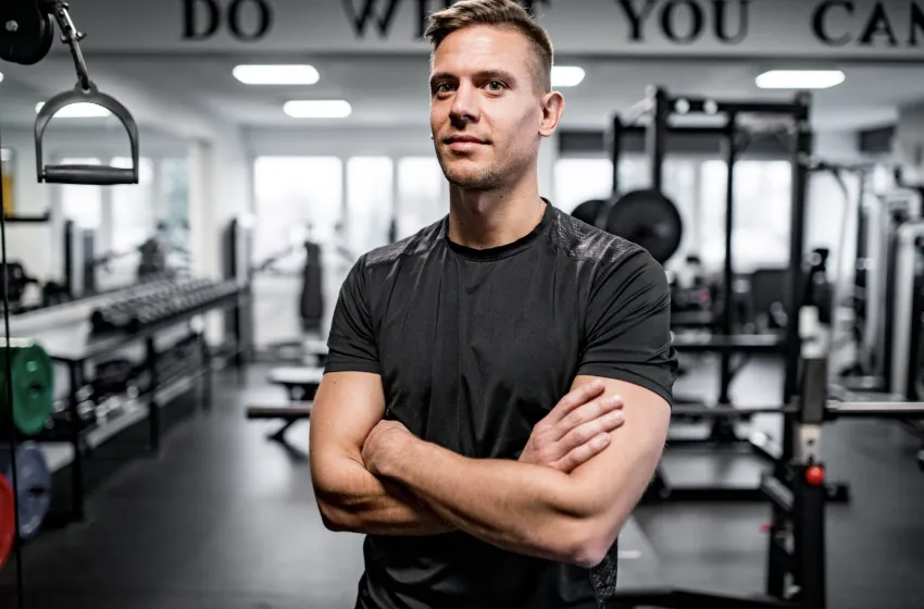 a pair of pink and black dumbs on a blue background