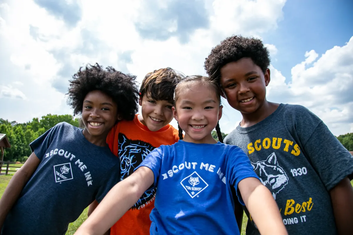 Parent and scout participating in outdoor activity