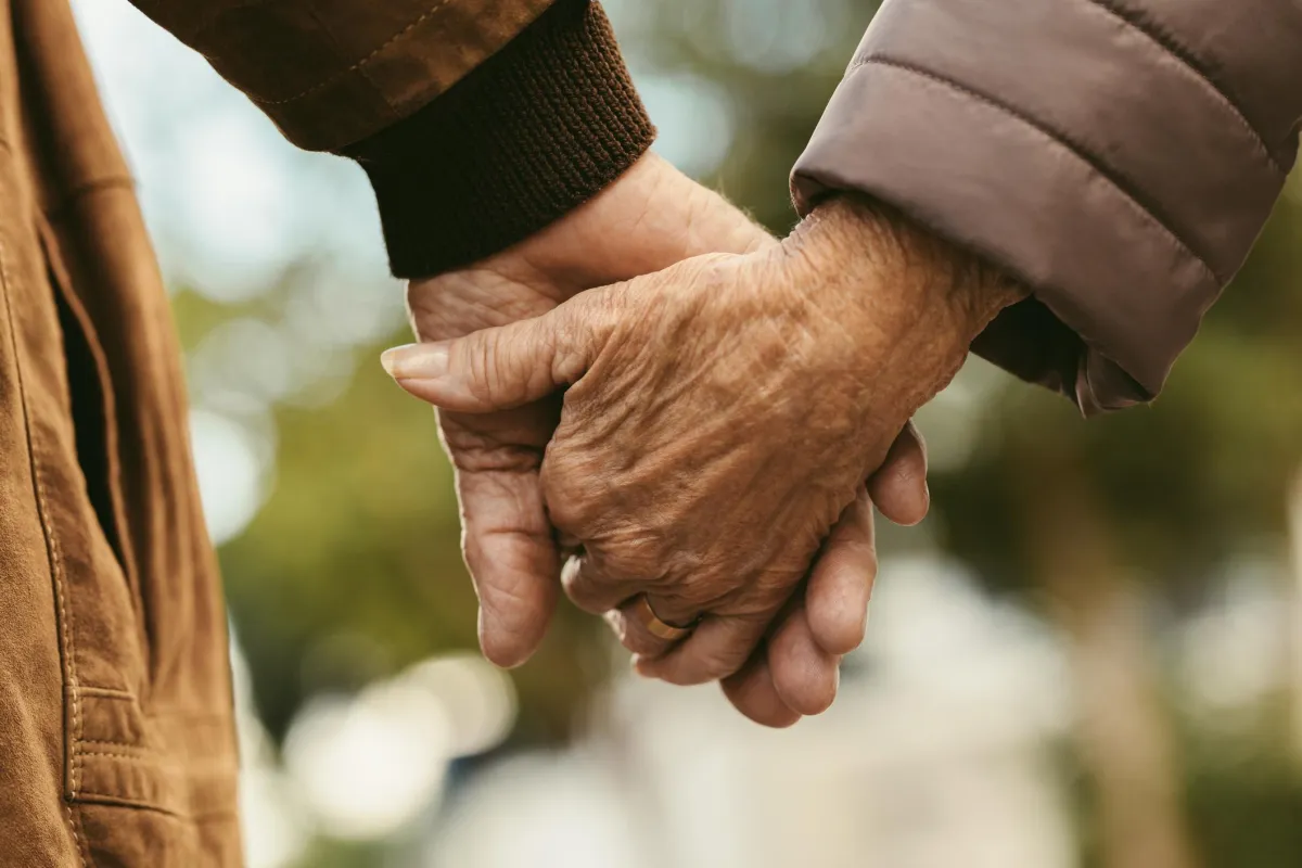 Couple holding hands