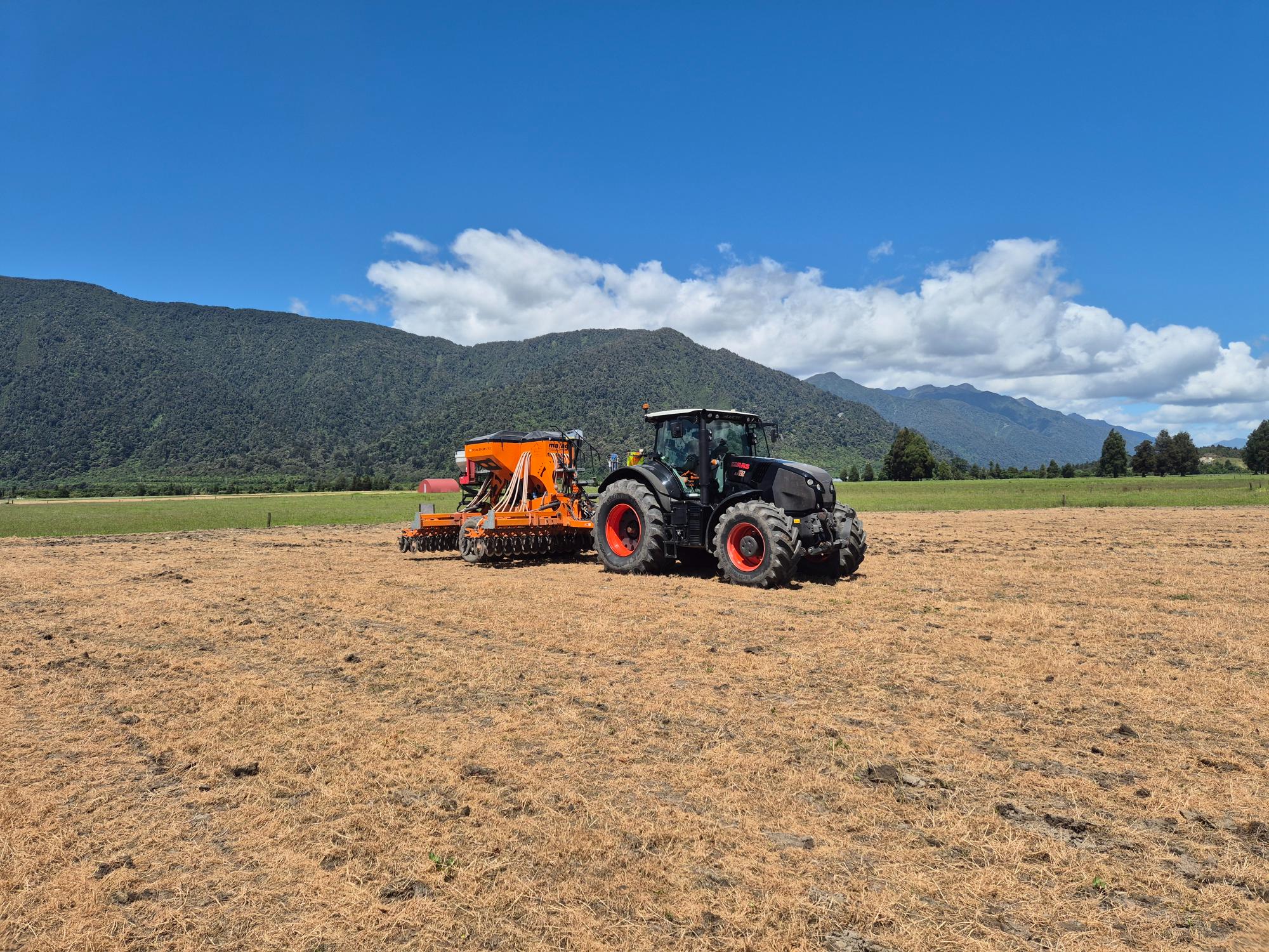 West Coast direct drilling tractor and seeder operating in Inchbonnie Moana New Zealand
