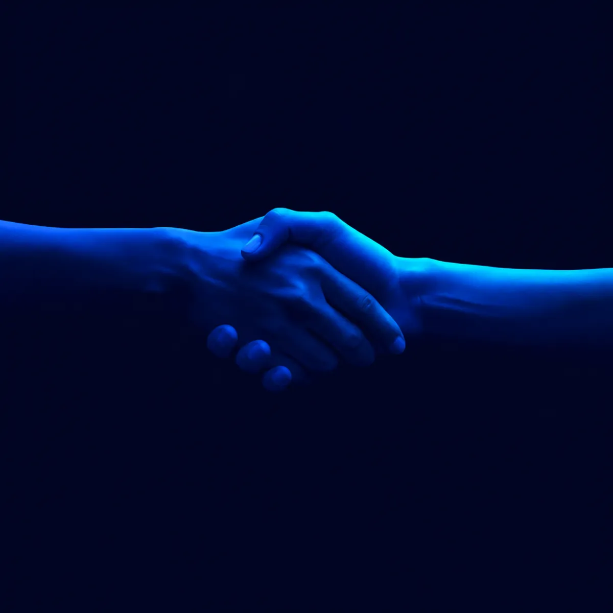 Two hands shaking in a gesture of agreement or partnership, illuminated by dramatic purple and pink lighting against a dark background.