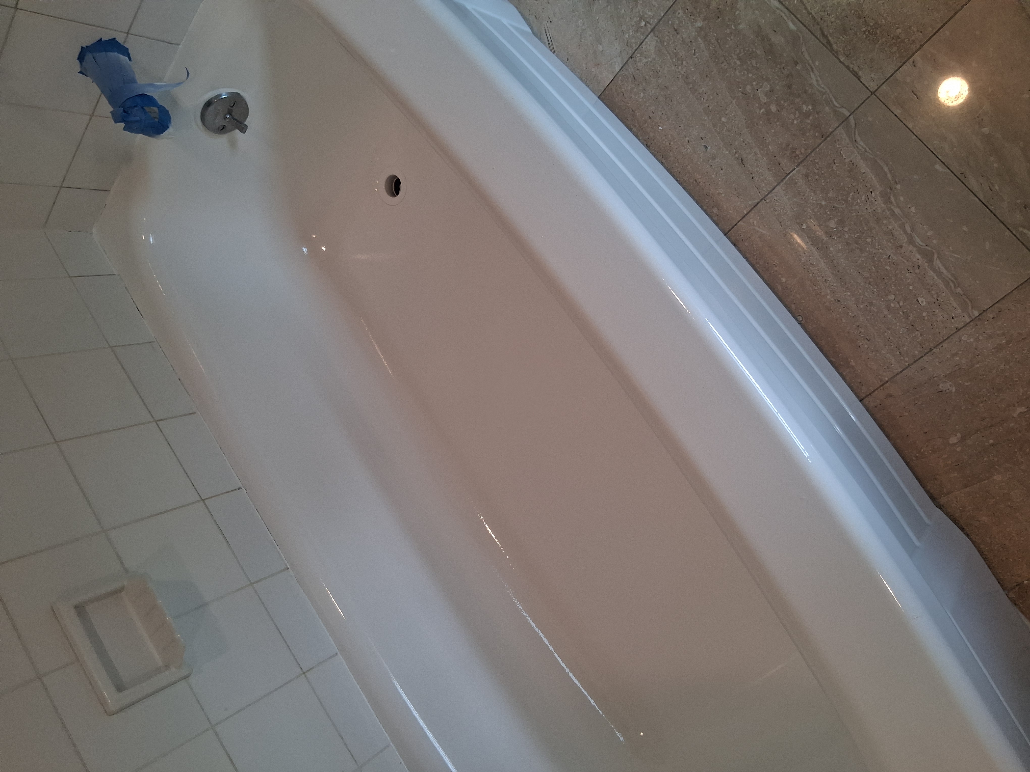 Bathtub resurfacing and floor tile project done y Paladin Bathub Resurfacing in Hoboken, NJ