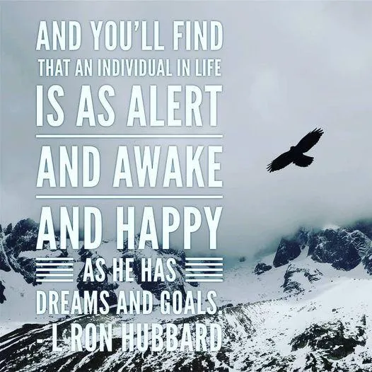 Young cricketer stands on field before stadium crowd.