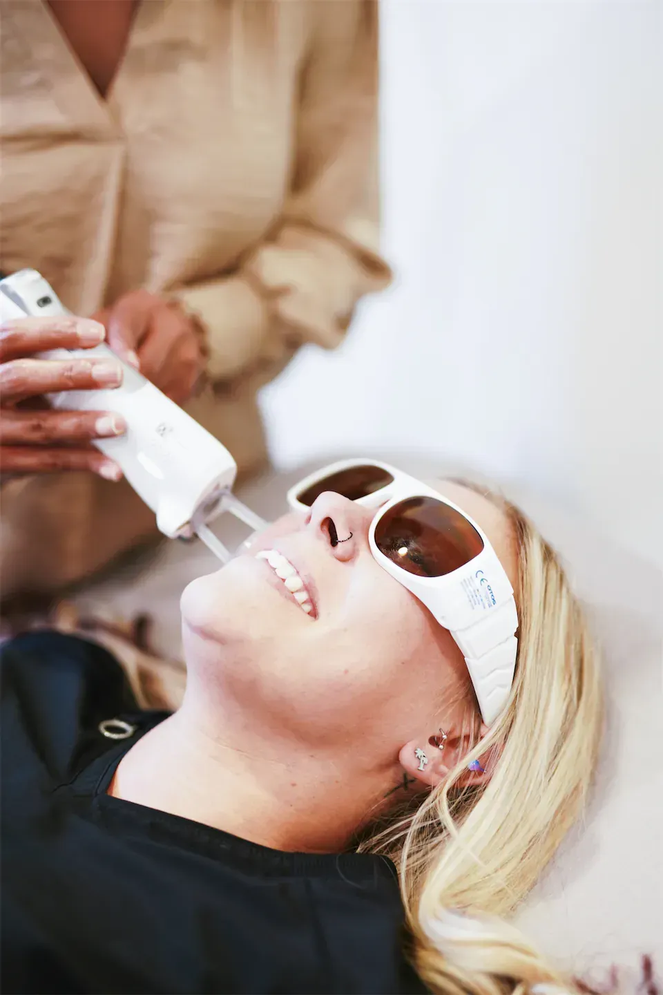 Patient receiving her laser-infused HydraFacial