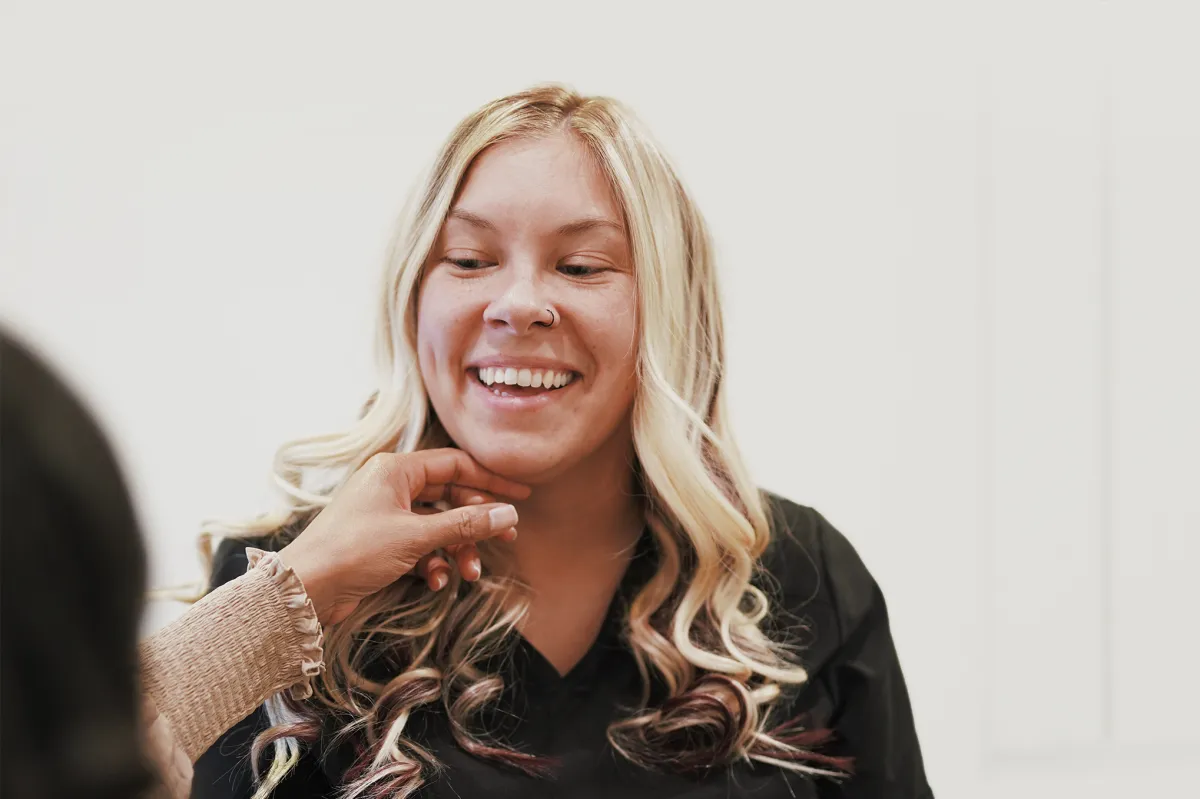Happy patient after her facial treatment
