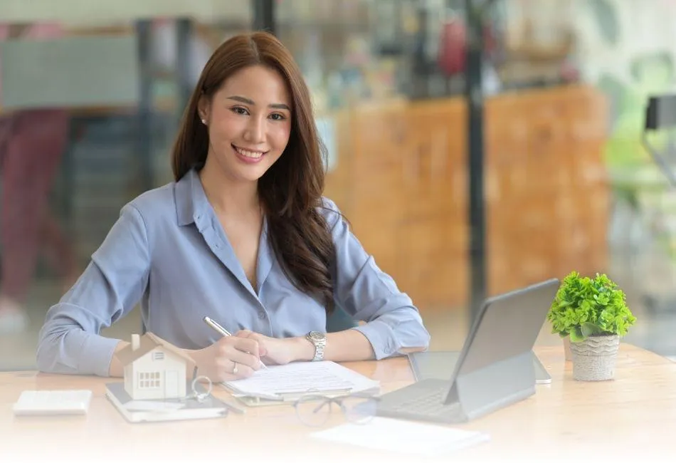 Loan Officer at desk working on a refinance