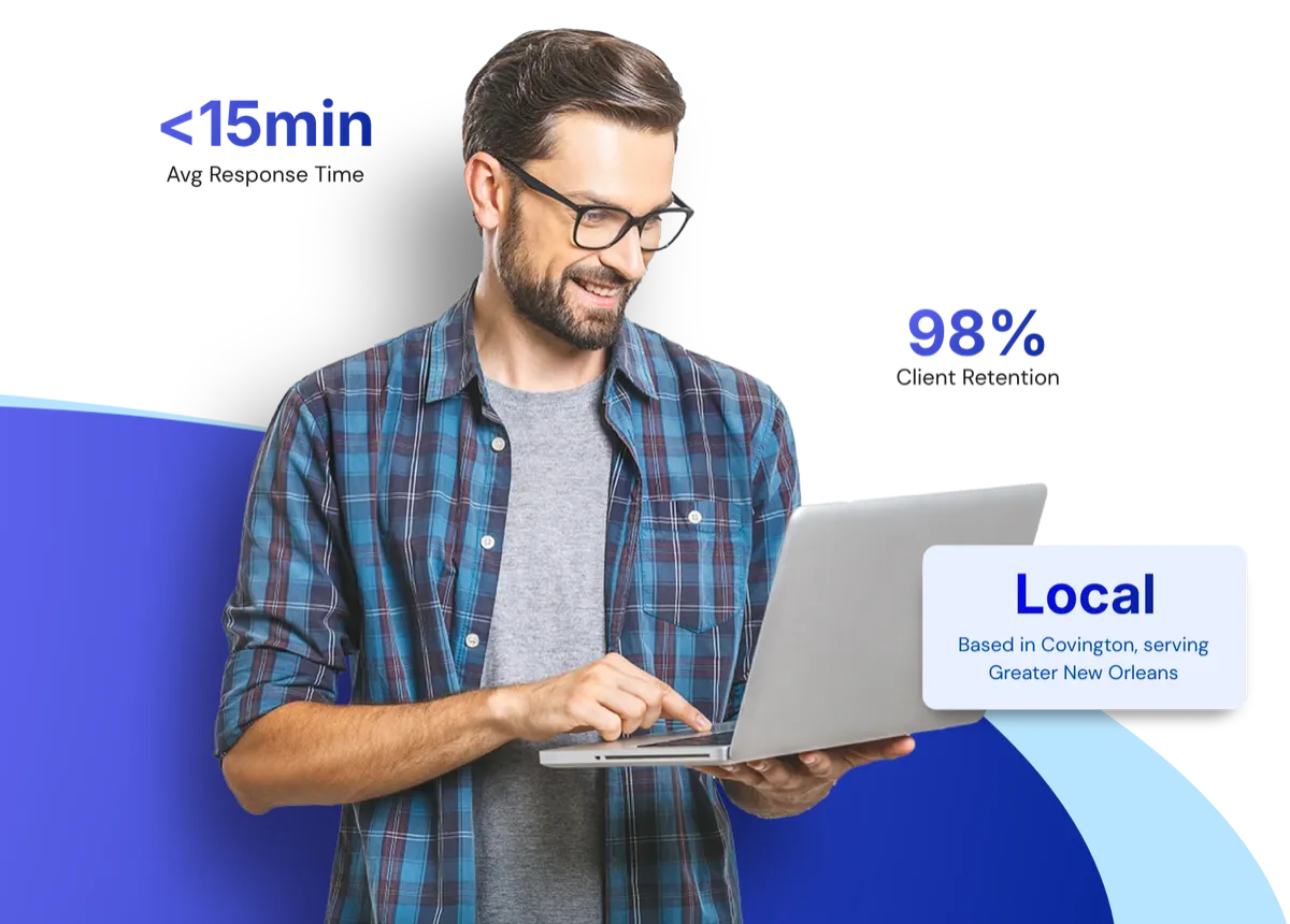 IT Tech, holding a laptop
