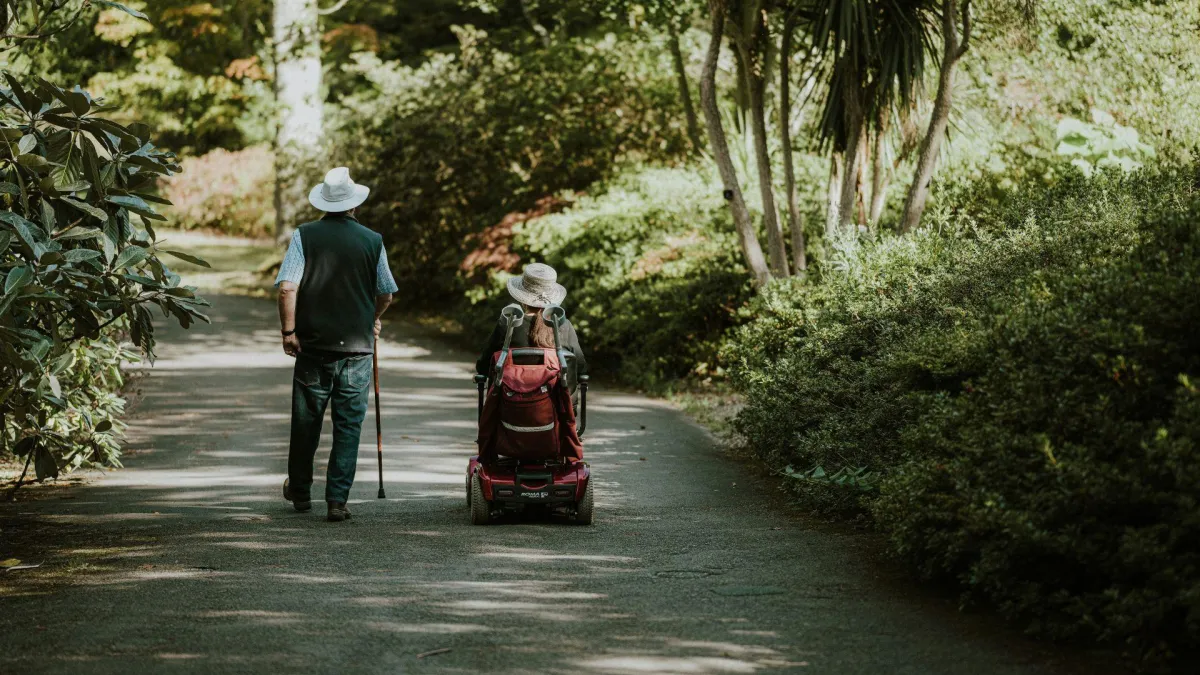 couple with disability in the park