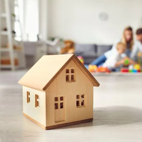 image of a house with family in the back