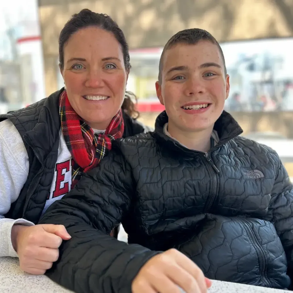 Nicole Price Morrow with her son, sharing autism parent support and guidance