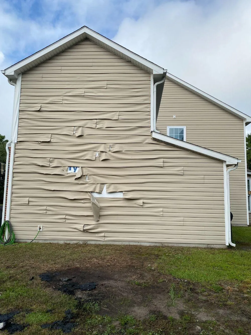 damaged siding that needs replacement