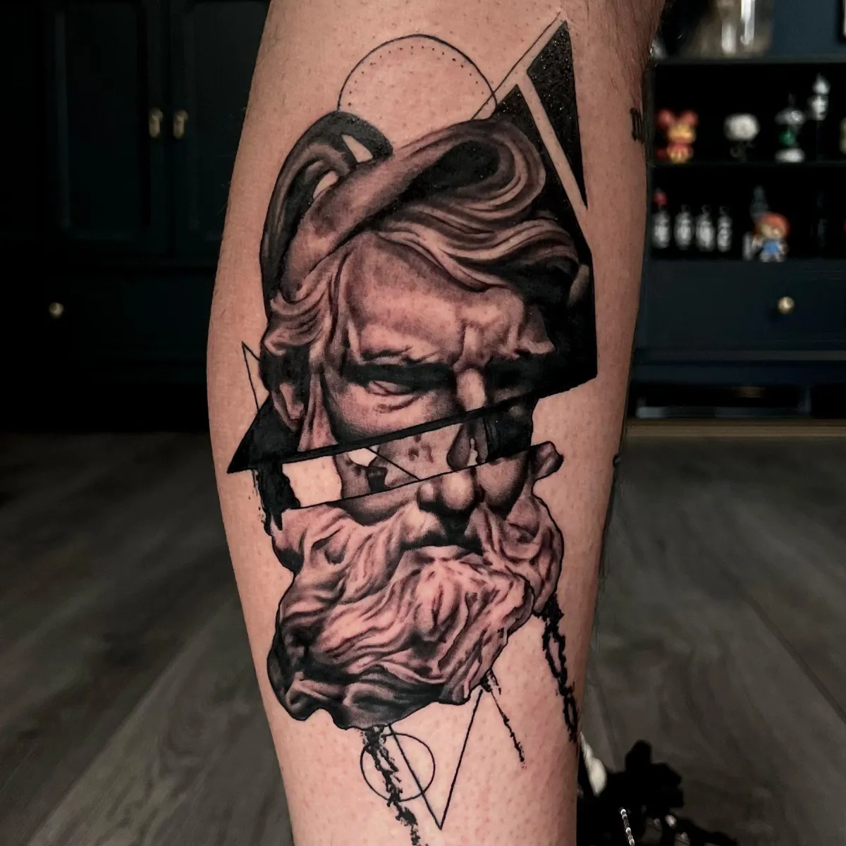 person in blue denim shorts and white nike sneakers standing on gray concrete floor