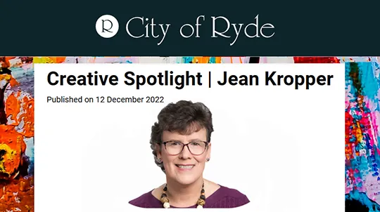 A feature article titled 'Creative Spotlight | Jean Kropper' published by the City of Ryde on December 12, 2022, with a professional headshot of Jean Kropper against a white background, framed by a colorful artistic border.