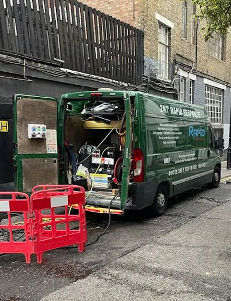 Plumber with customer in the bathroom