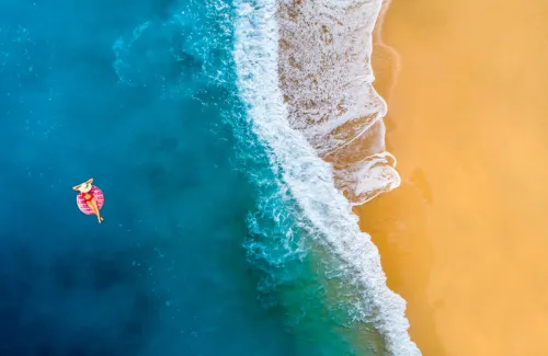 woman floating in ocean